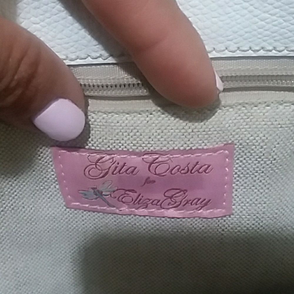 Gita Costa Tote bags